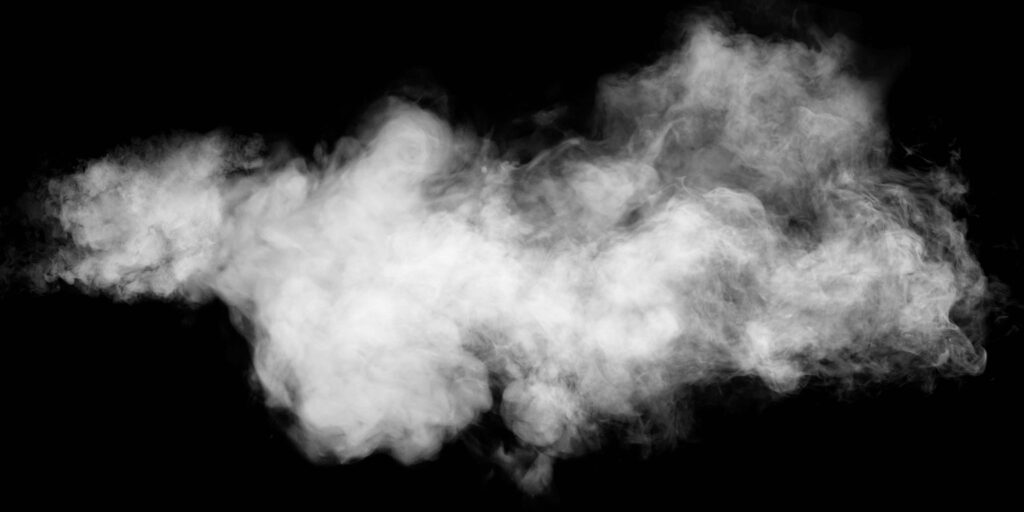 Indoor Air Quality photo of smoke cloud hanging in the air with a black background