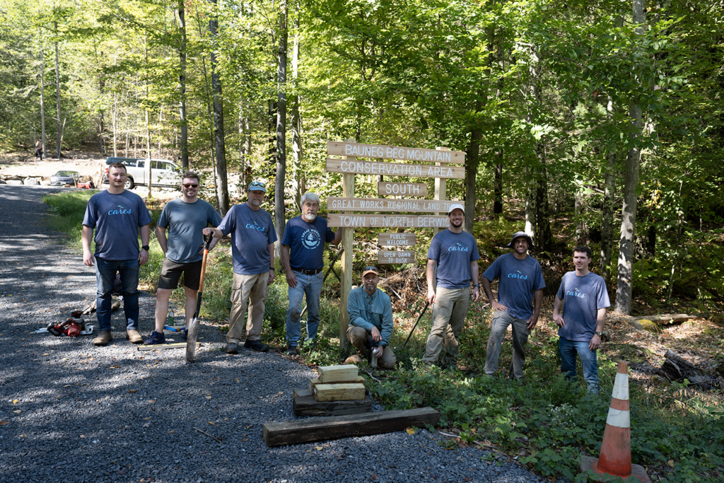 Images of Haley Ward employee-owners and their efforts to expand the trail system at Bauneg Beg Mountain Conservation Area.